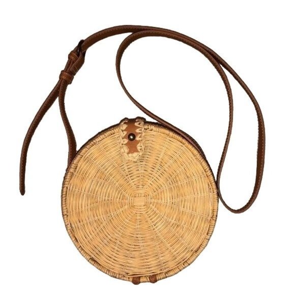 Universal Thread Handbags - Wicker handbag with leather accents snap closure. Has an adjustable strap